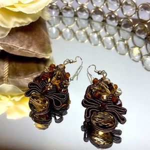 Brown material crystal earrings.